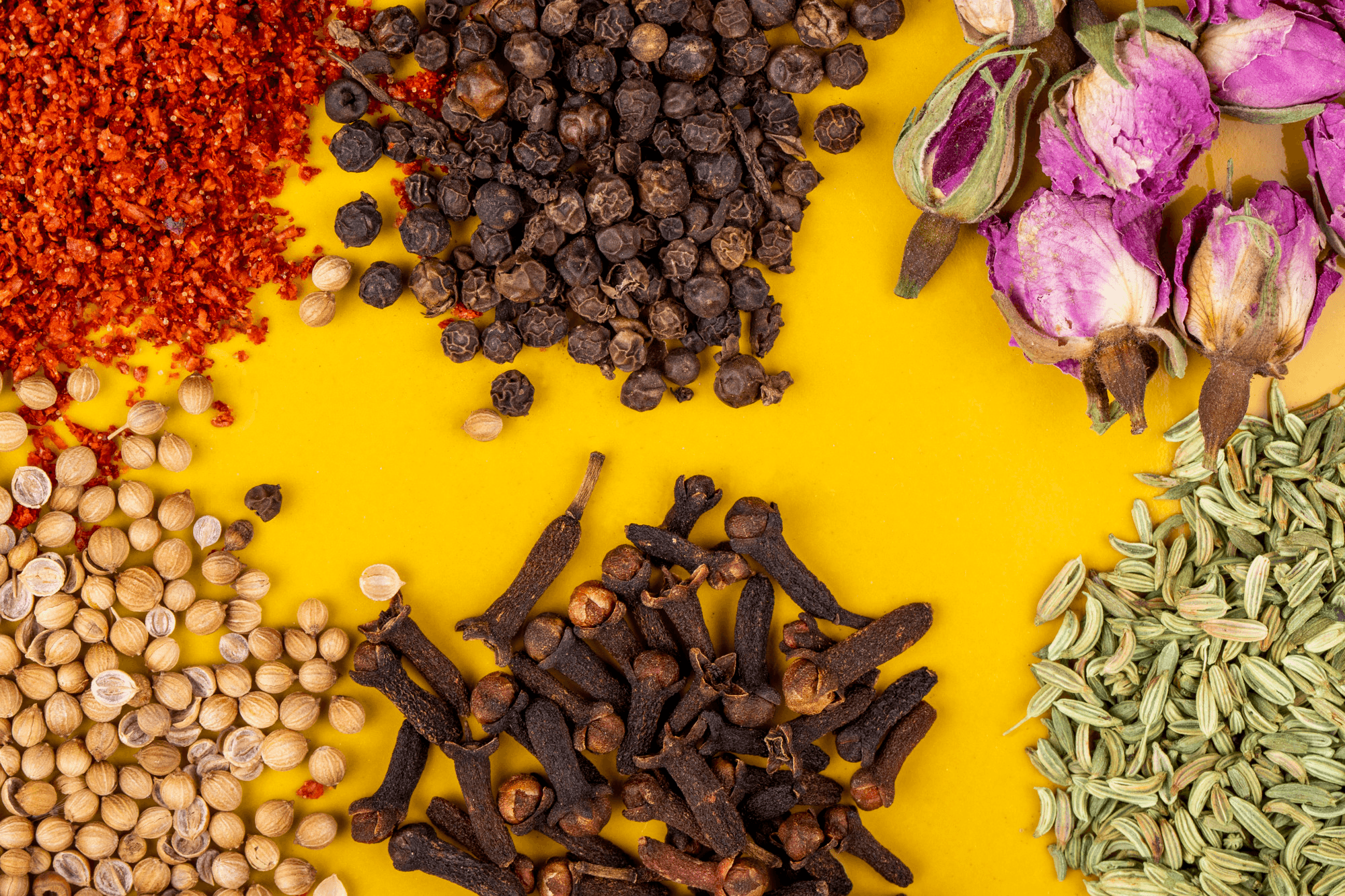 An assortment of ground and whole spices